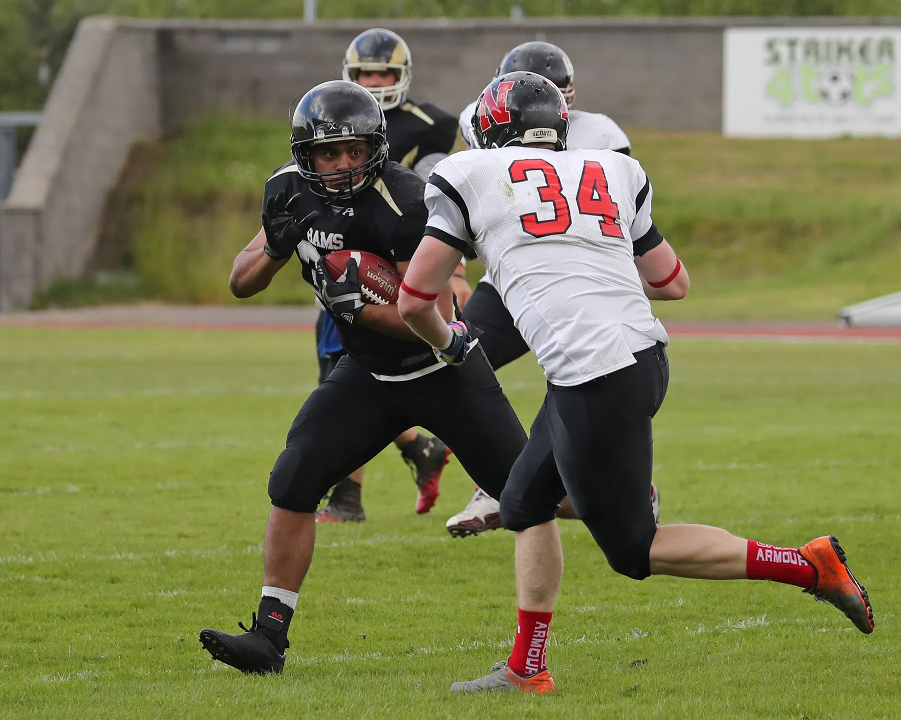 Spencer Hind runs the ball