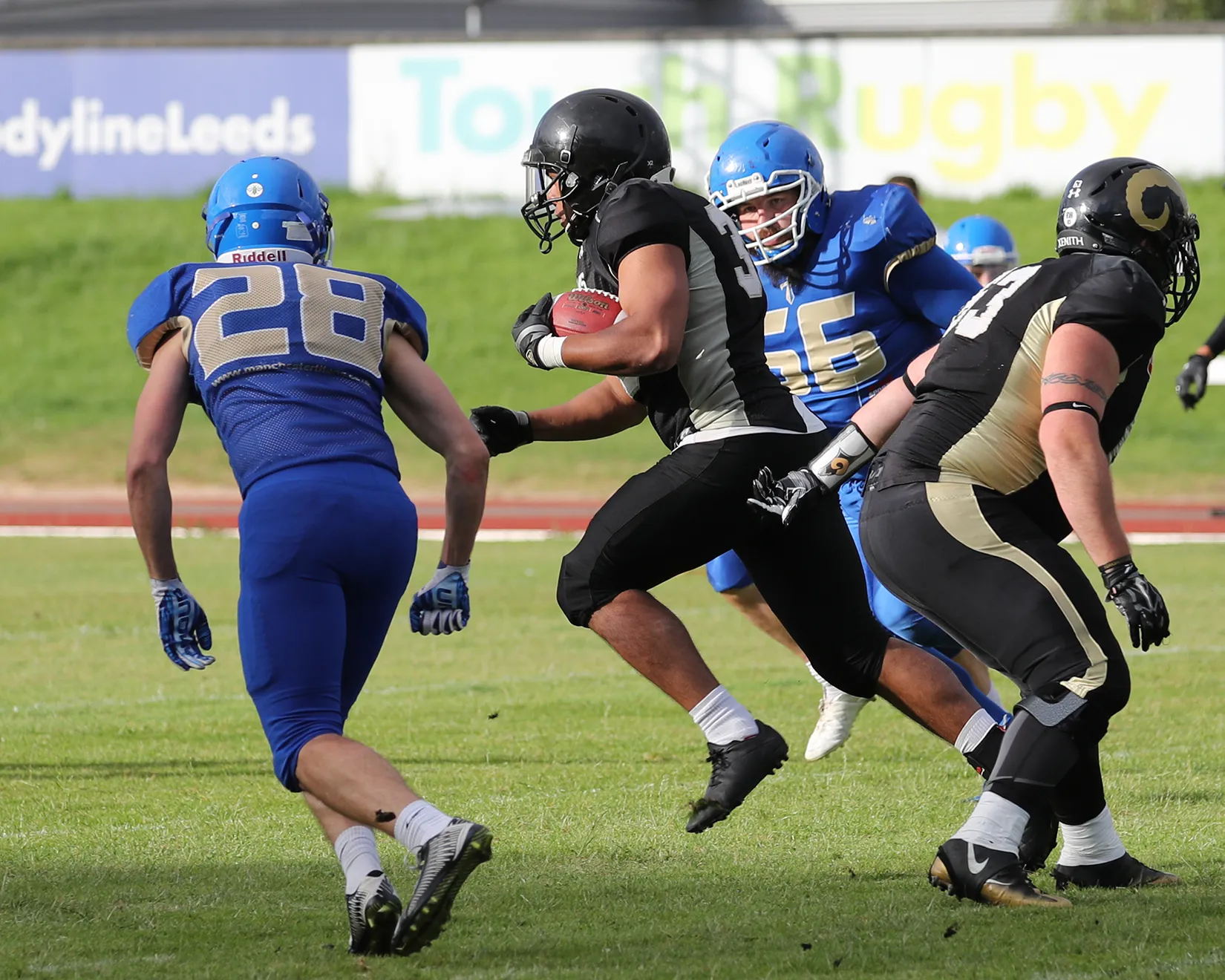 Spencer Hind runs the ball