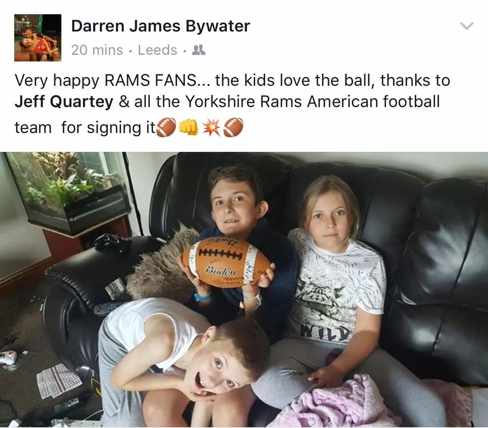 Young Rams fans receive a signed ball