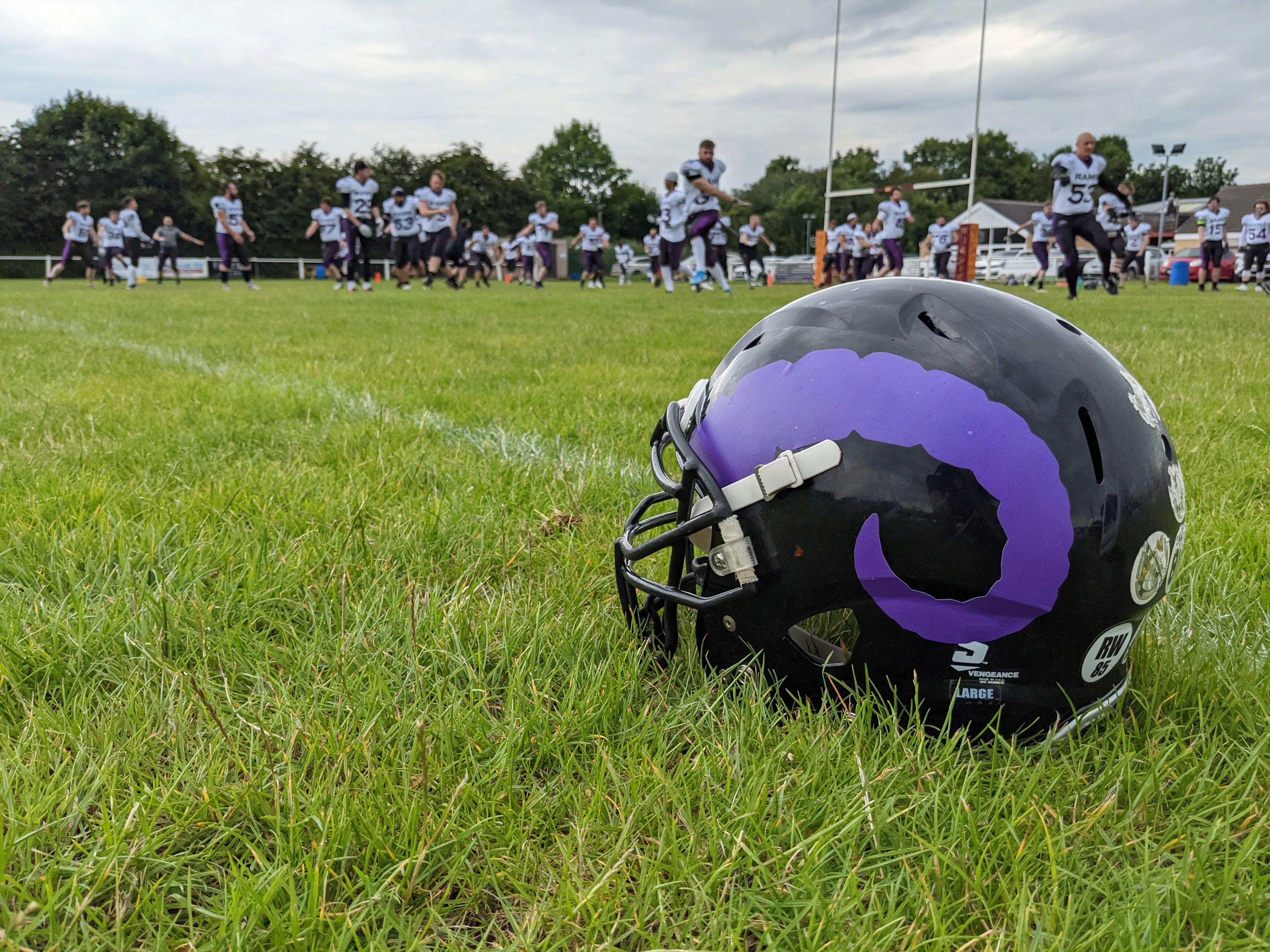 A Rams helmet on the field as the players warm up