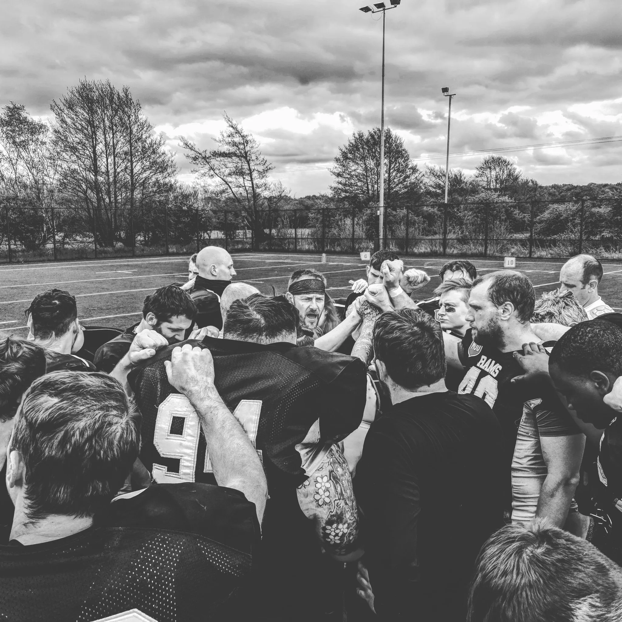 The Rams huddle after the victory